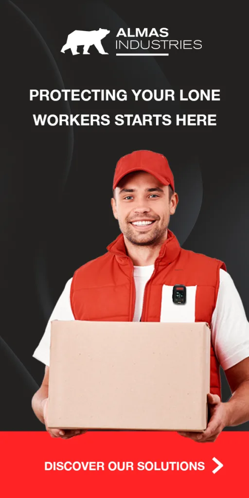A delivery man in red hat and gilet carrying a box