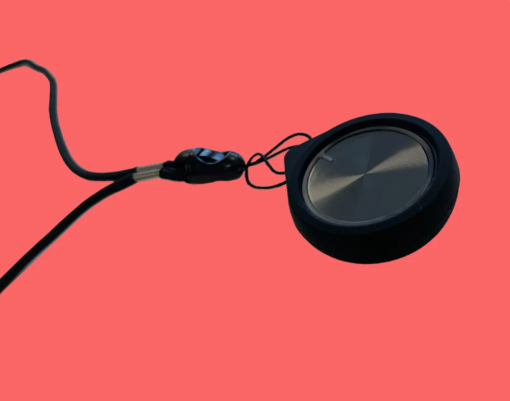 Bluetooth button on a black lanyard